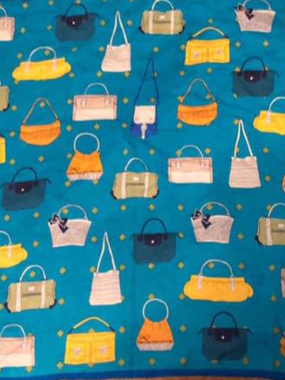 Purses and Handbags on Blue Silk Scarf